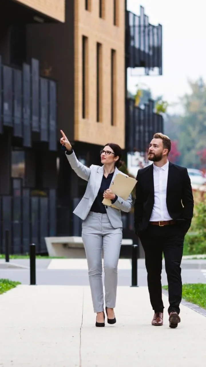 female-real-estate-agent-showing-properties