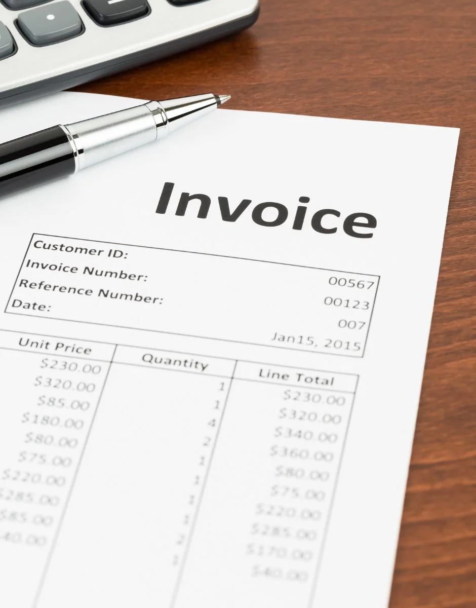 invoice-with-pen-and-calculator