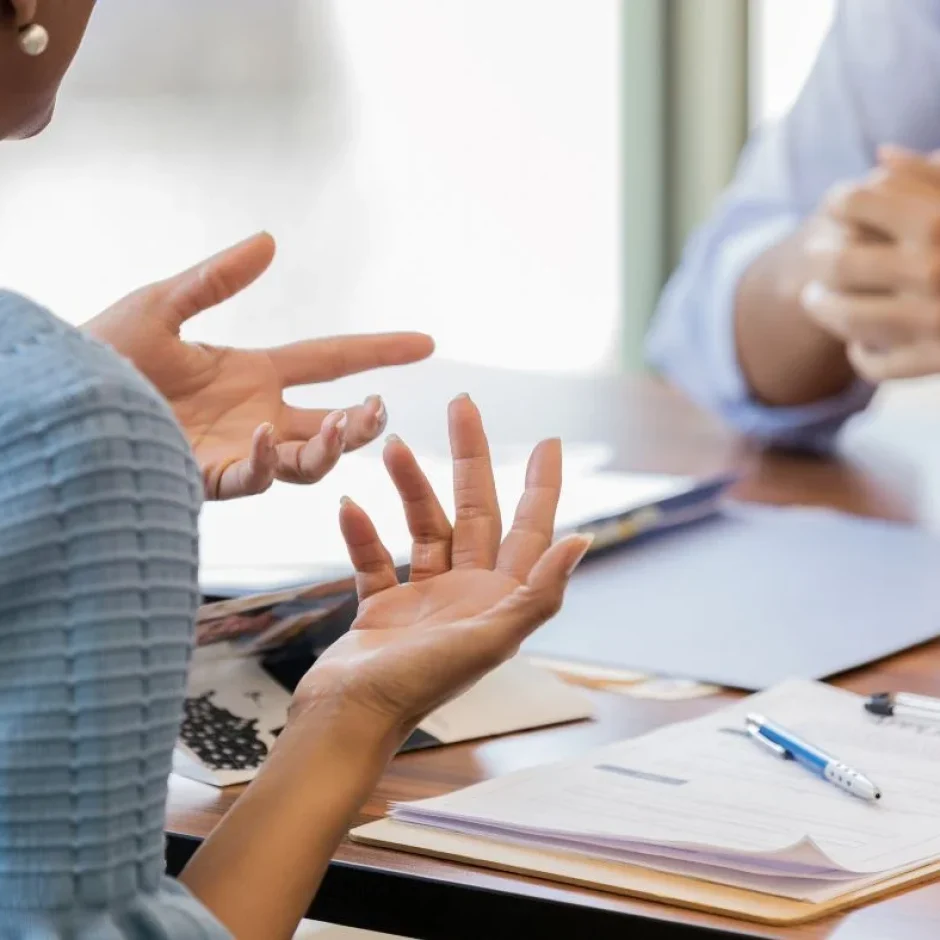 woman-discusses-loan-with-bank-officer