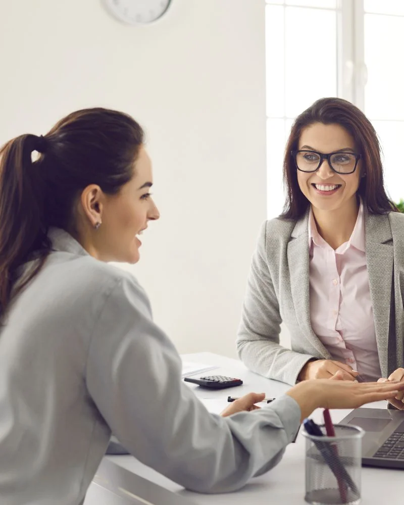 female business owner consulting a business loan broker