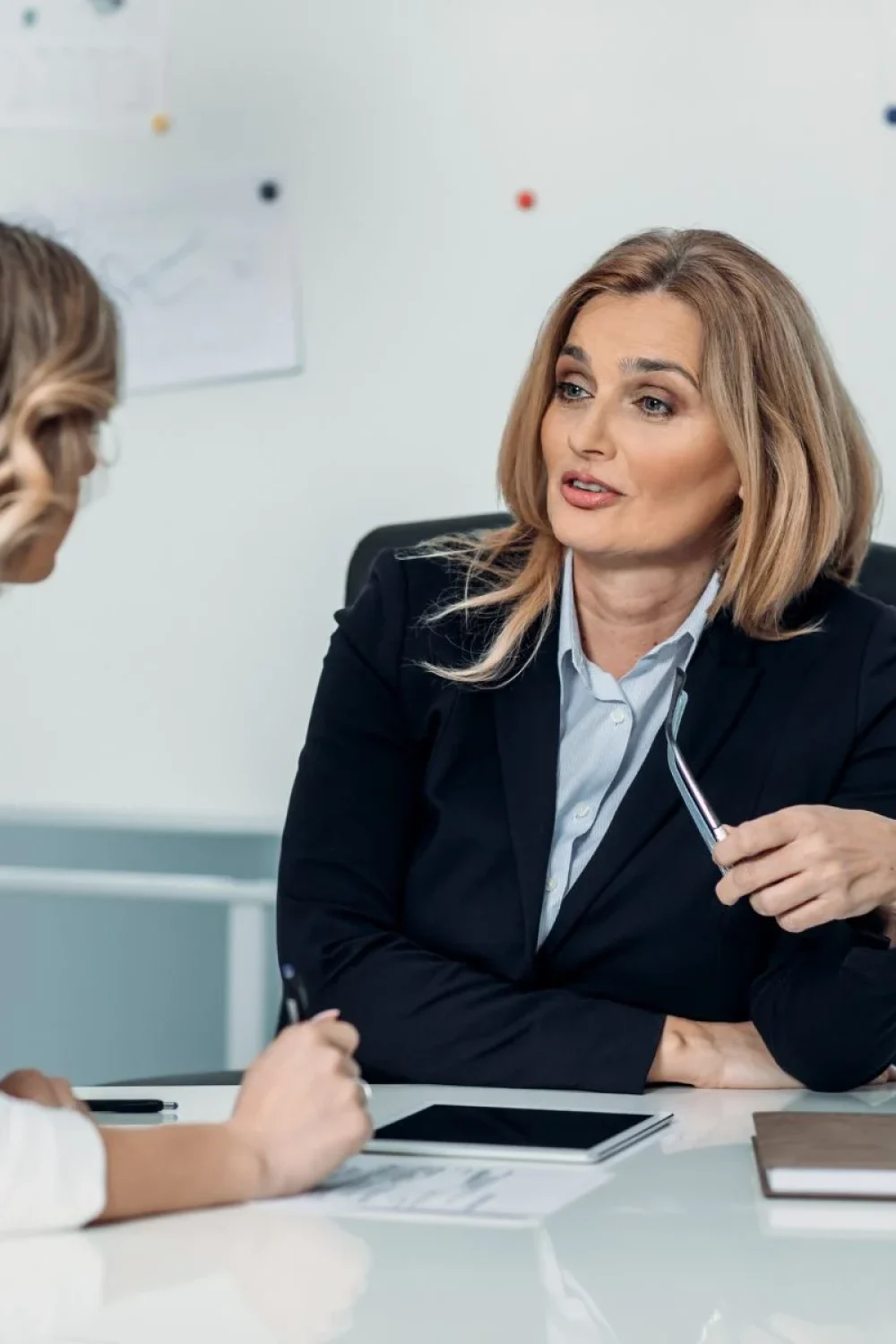 female business finance expert talking to customer